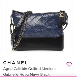 Chanel purse. Hobo bag in navy. Like new.